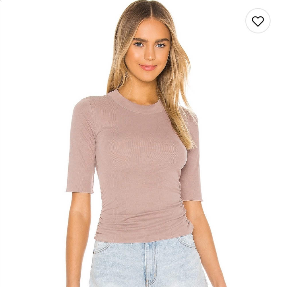 Like new, ribbed three-quarter length sleeve free people shirt with ruched sides